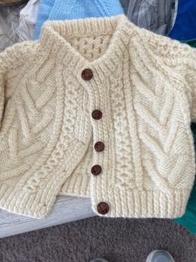 Child’s hand-knitted cardigan
